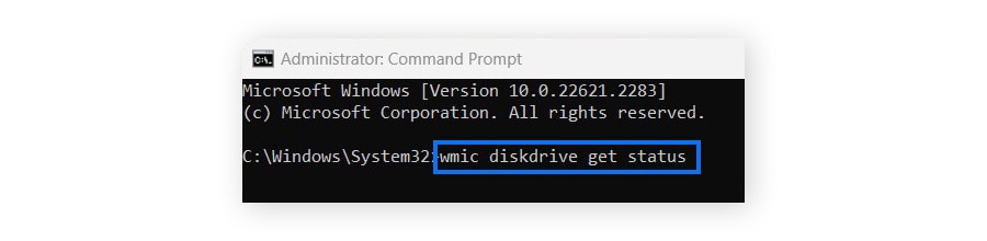 Typing "wmic diskdrive get status" into Windows cmd to check hard drive S.M.A.R.T. status.